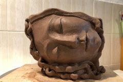 Maceta dormida. barro.