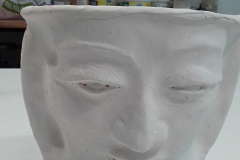Maceta con rostro.